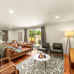 Modern Retreat w/ Hot Tub, Peloton, Gym, and BBQ